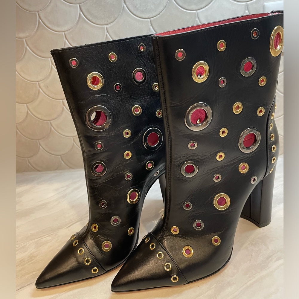 Blumarine leather heeled ankle boots with gold and gunmetal grommets
